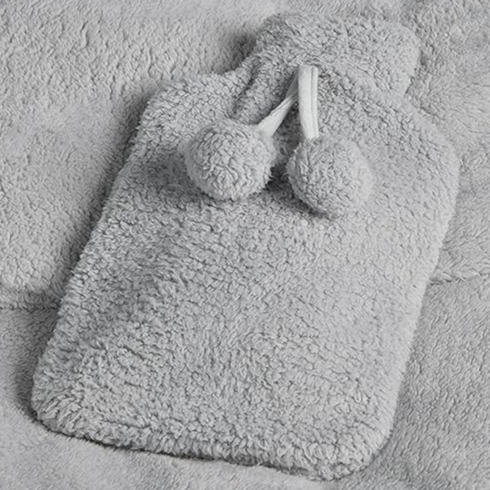 Elite Heat hot water bottle with removable plush cover, perfect for winter in grey